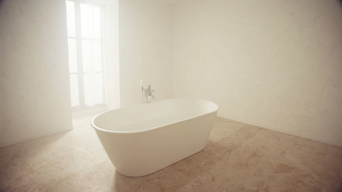 Dimension baignoire îlot : baignoire posée au centre d'une salle de bain, dégagements visibles sur les quatre faces Image